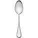 A Libbey stainless steel European tablespoon with a white background.