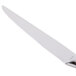 A Libbey stainless steel steak knife with a silver handle.