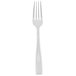 A silver Libbey stainless steel dinner fork with a white background.