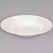 A Libbey ivory porcelain pasta bowl with a wide rim on a white background.