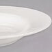 A Libbey ivory porcelain pasta bowl with a wide rim.