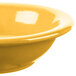 A close-up of a yellow Libbey Cantina fruit bowl.