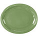 A sage green rectangular platter with wavy edges.
