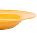 A yellow Libbey Cantina porcelain pasta bowl.