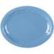 A blue oval porcelain platter with wavy white lines.