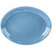 A blue oval Libbey porcelain platter with wavy lines on the edges.