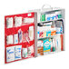 A three-shelf first aid kit cabinet containing various medical supplies and medications.