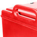 A red plastic Cambro soup carrier with handles.