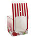 A red and white striped Baker's Mark candy apple box with a window.
