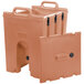 A beige plastic Cambro Camtainer with handles.