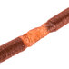 A roll of brown plastic Weston Smoked Collagen Sausage Casing on a white surface.
