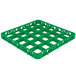 A green plastic Carlisle glass rack extender with squares on it.
