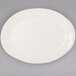 A Libbey ivory porcelain oval platter with a rim.