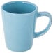 A close-up of the handle of a blue Libbey Farmhouse mug.