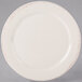 A white porcelain plate with a brown rim.