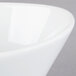 A close-up of a Libbey Neptune bowl with a curved edge.