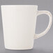 A Libbey ivory porcelain mug with a handle.