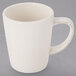 A Libbey ivory porcelain mug with a handle.