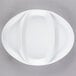 A white porcelain divided platter with three sections.