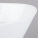 A close up of a Libbey Neptune bowl with a curved edge.