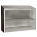 An Advance Tabco stainless steel wall cabinet with shelves.