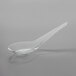 Visions 5 1/2 inch Clear Plastic Asian Soup Spoon - 50/Pack