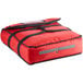 A red ServIt insulated pizza delivery bag with black straps and a zipper.