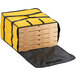 A yellow Choice insulated pizza delivery bag holding a stack of pizza boxes.