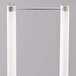 A white rectangular object with two white tubes and metal rods.