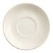 An Acopa ivory stoneware saucer with a rolled edge and circle in the middle on a white surface.