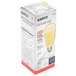 A white box of Satco transparent amber LED light bulbs.