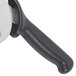 A Dexter-Russell pizza cutter with a black handle.