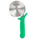 A Dexter-Russell pizza cutter with a green handle.
