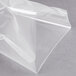 A package of clear ARY VacMaster vacuum packaging bags on a gray surface.
