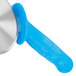A Dexter-Russell pizza cutter with a blue plastic handle.