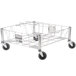 A Rubbermaid stainless steel dolly with black wheels.
