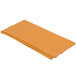 A folded Creative Converting Pumpkin Spice Orange plastic table cover.