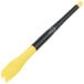 A yellow and black plastic Mercer Culinary saw tooth brush plating tool.