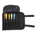 A black carrying case with six different colored Mercer Culinary silicone brushes.