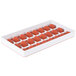 A white silicone tray with 24 red heart-shaped molds.