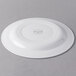A white Libbey porcelain plate with a circular design on the rim.