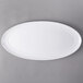 A white Libbey oval porcelain tray.