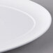 A white Libbey porcelain tray with a white rim.