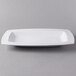 A white rectangular Libbey porcelain bowl on a gray background.