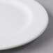 A Libbey white porcelain plate with a medium rim.