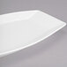 A white Libbey rectangular porcelain serving tray with curved edges.