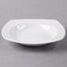 A white Libbey square porcelain deep rimmed soup bowl.