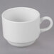 A white tea cup with a handle.