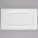 A white rectangular Libbey porcelain tray with a white border.