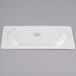 A white rectangular Libbey porcelain tray with a wide rim.
